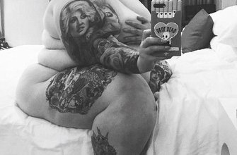 Тесс Холидей